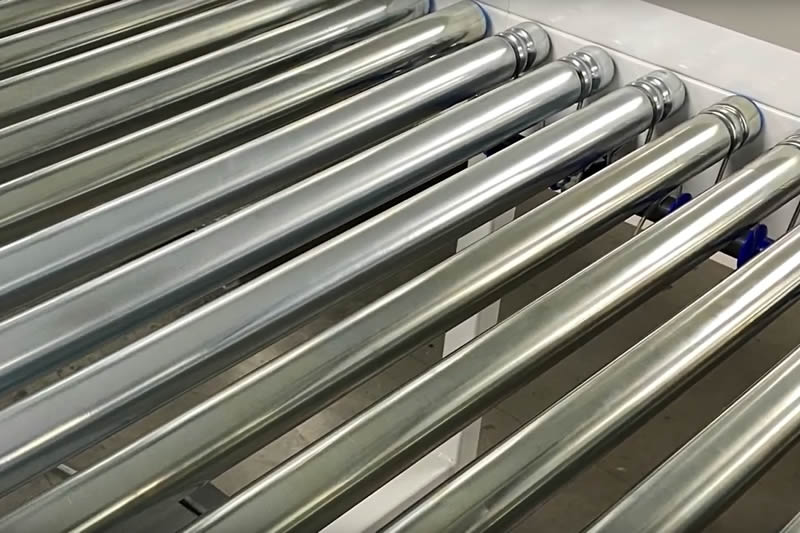 Amber Industries - Convoyeur à arbre de transmission à transfert transversal par chaîne à 90 degrés