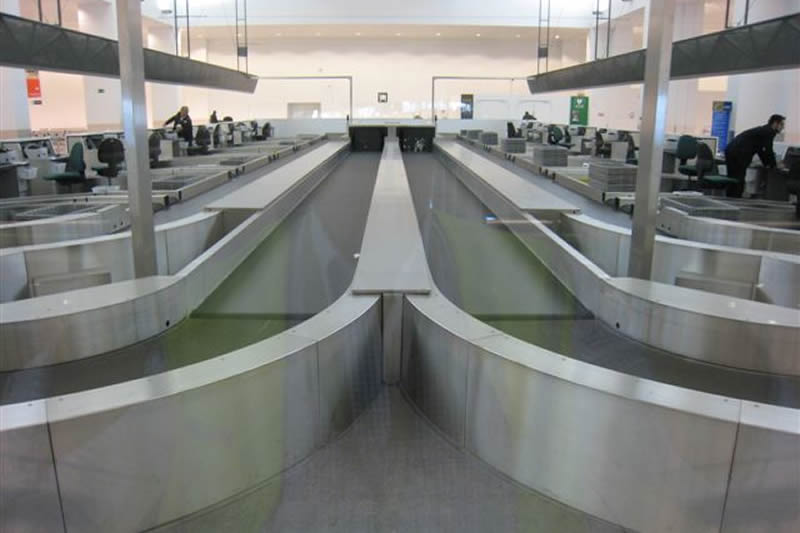 Belt Curves for Airport Baggage Handling Systems